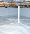 A sealed crawl space in Del Rio with a vapor barrier