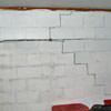 A buckling foundation wall in a Cuero home.