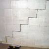 A diagonal stair step crack along the foundation wall of a Lockhart home
