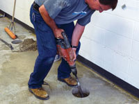 Coring the concrete of a concrete slab floor in Uvalde