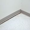 A partition wall separating from the floor in a Pleasanton home.