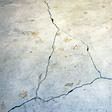 foundation heaving cracks in a slab floor in San Marcos