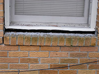 A window sill cracking and separating from the foundation wall in a Hondo home.