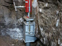 Foundation repair contractors lifting a structure in Victoria.