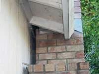 A chimney leaning away from the home on a Cuero foundation