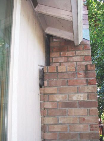 sinking, leaning chimneys that are in danger of collapse in Gonzales