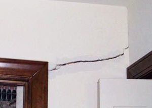 A large drywall crack in an interior wall in Eagle Pass