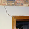 A large settlement crack on interior drywall in a Schertz home.