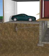 A street creep repair system implementing foundation wall anchors in a Cuero home.