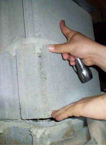 a completely failing concrete crawl space support pillar in Castle Hills
