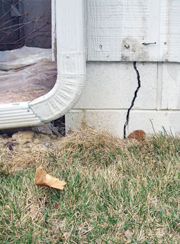 foundation wall cracks due to street creep in Devine